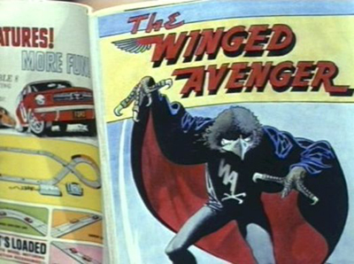 Itâs a reference to an episode of The Avengers from 1967 entitled The Winged Avenger. Inspired by the then popularity of the Adam West Batman TV Series, it featured a murderer who dressed as the eponymous hawk-headed comic book villain and included illustrations by the veteran master comic artist Frank Bellamy.