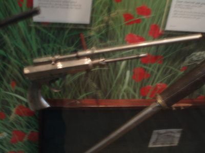 The air gun is based on one that I snapped in the Police Museum of Paris (Le Musée de la Prefecture), which is housed in the police station of the 5th arrondisement, which is a bit unnerving to be in, as itâs milling with suspects and perps the cops have arrested or have taken in for questioning. Itâs strictly forbidden to take photos in there, which is why the snaps are a bit blurry, taken with the flash off and held so as not to be spotted by the surveillance cameras.